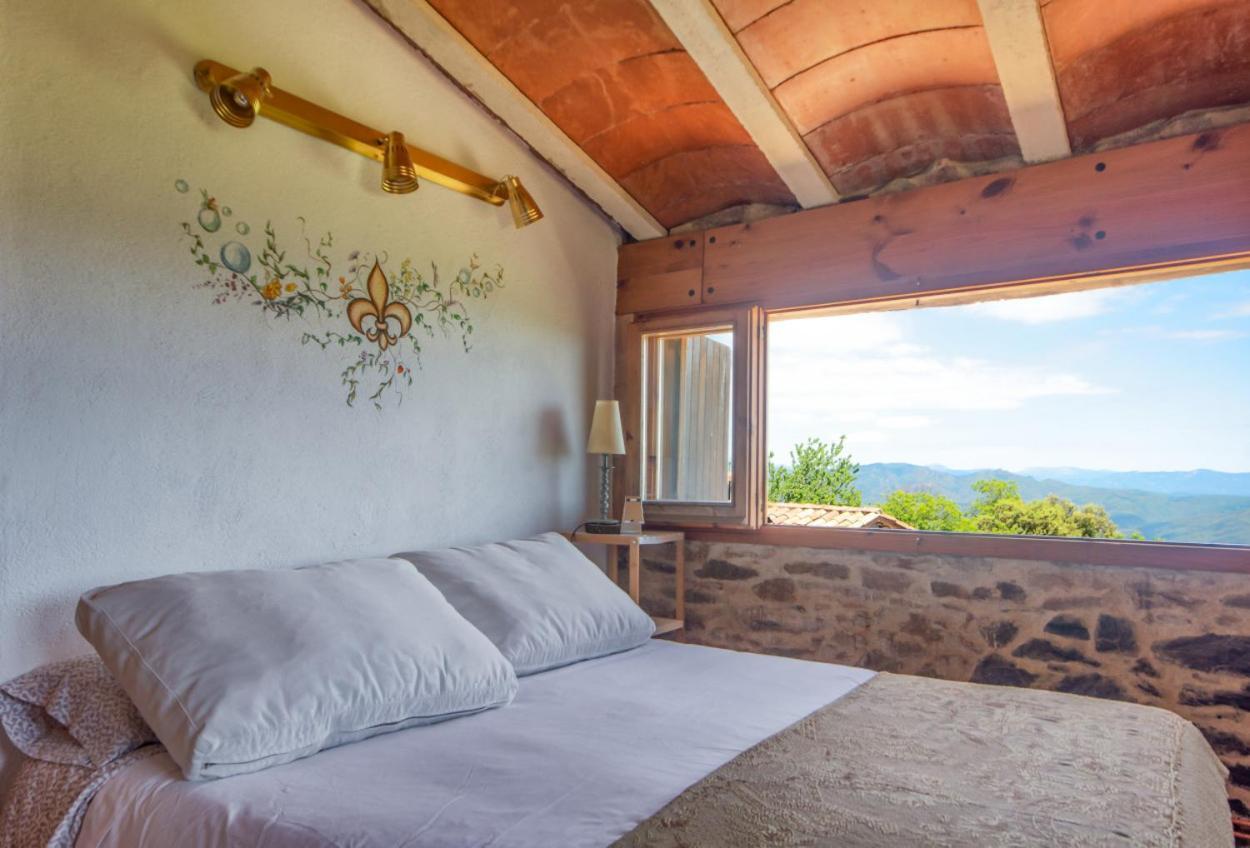 Apartamento duplex rural con chimenea y vistas panorámicas desde la cama Sant Marti Sacalm Exterior foto